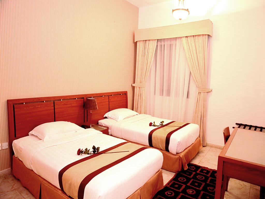 Arcadia Hotel Suites Sharjah Rum bild